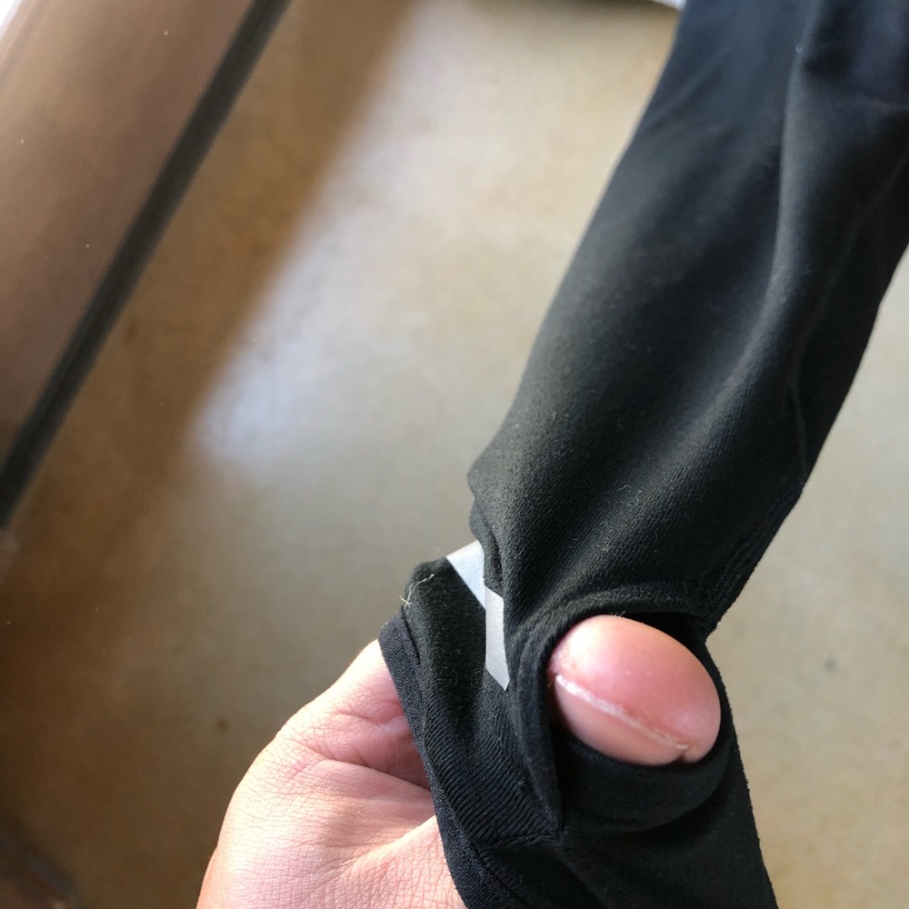 A Nike pull over with hood zippers and thumb holes - Picture 5 of 6